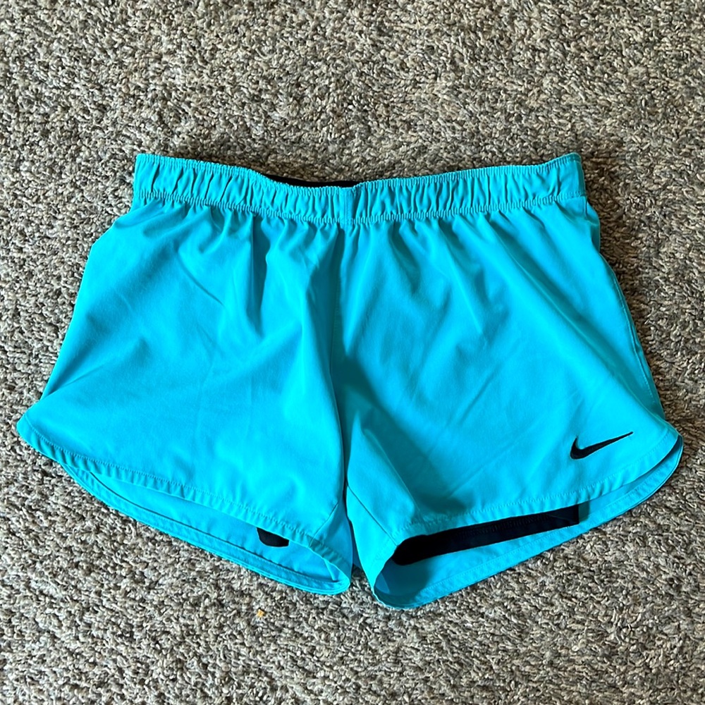 Aqua blue Nike shorts with attached spandex size small